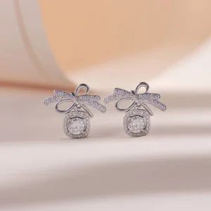 Bow Moissanite Drop Earrings In Platinum Plated Silver
