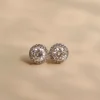 round-moissanite-stud-earrings-in-silver-finish-1