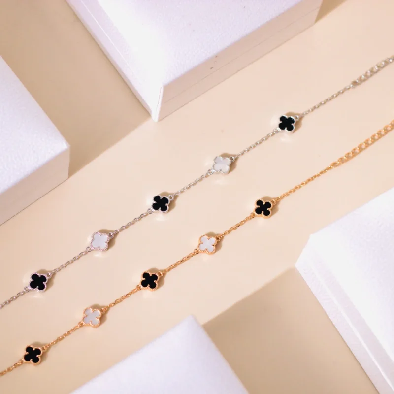 silver-bracelet-with-cz-four-leaf-clover-charms-1